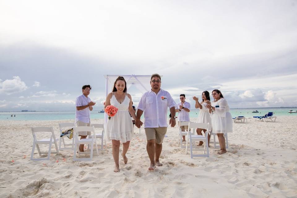 Vow renewal in beachscape Canc