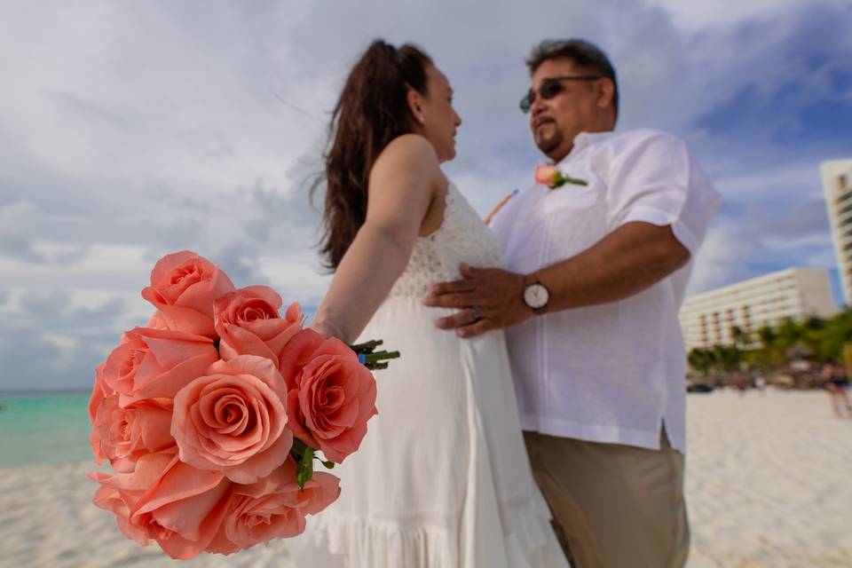 Vow renewal in beachscape Canc