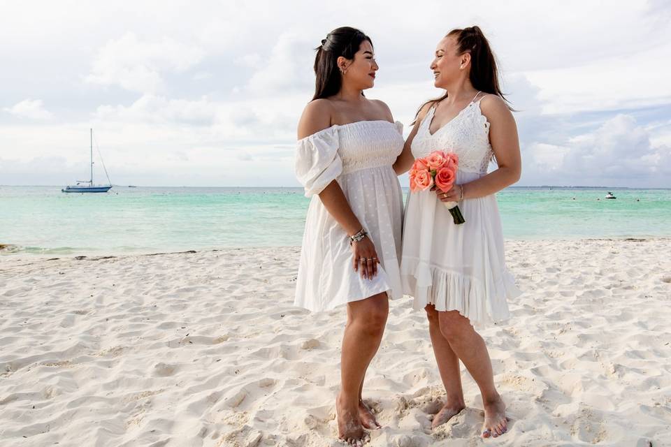 Vow renewal in beachscape Canc