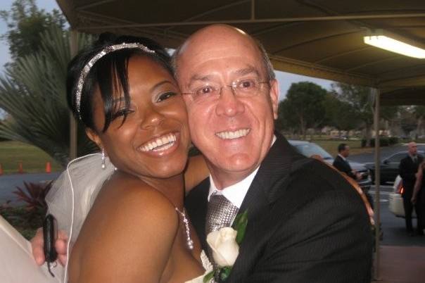 Love produces the biggest smile! Coral Springs, Fl. Bride and father in law.