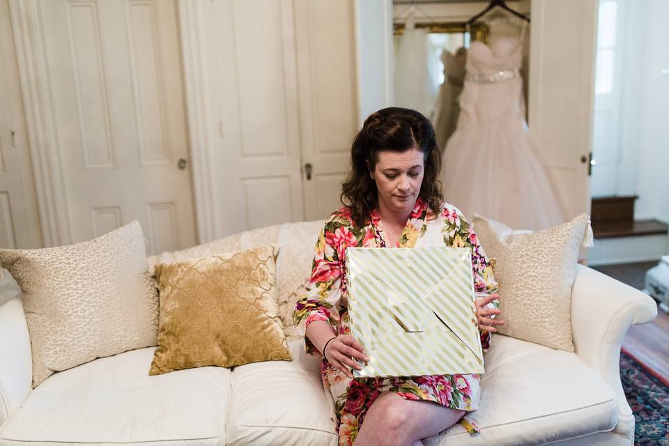 Accepting his gift in the bride's suite