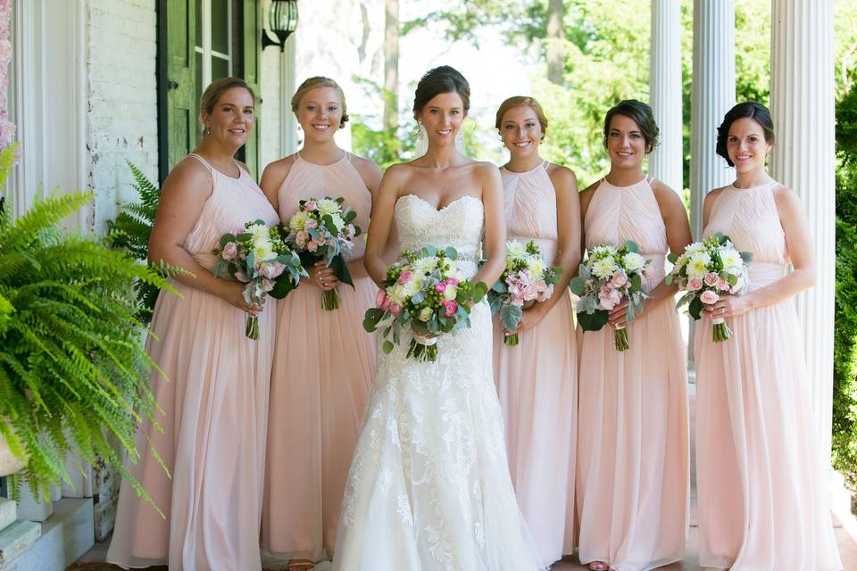 Happy bridal party on the front porch