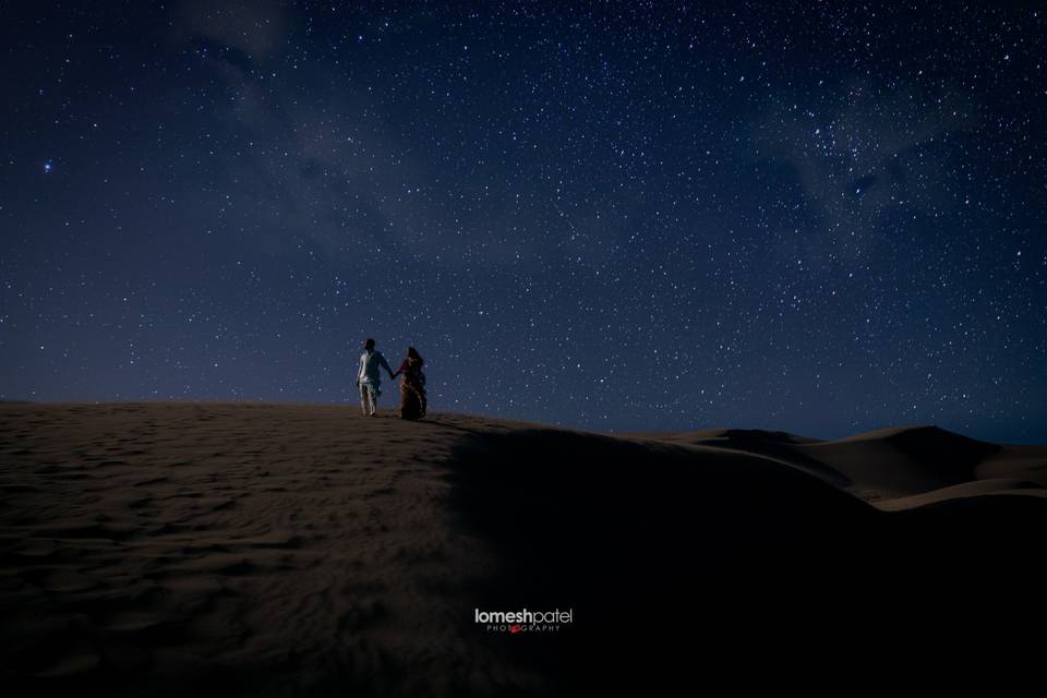 Romantic portrait against starry sky