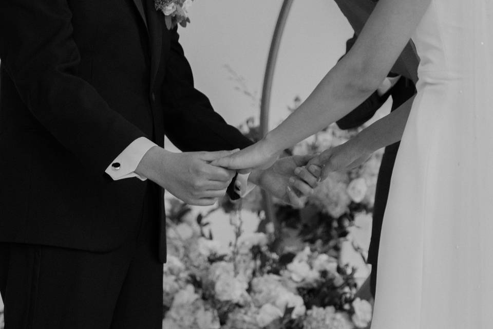 Holding hands at the altar