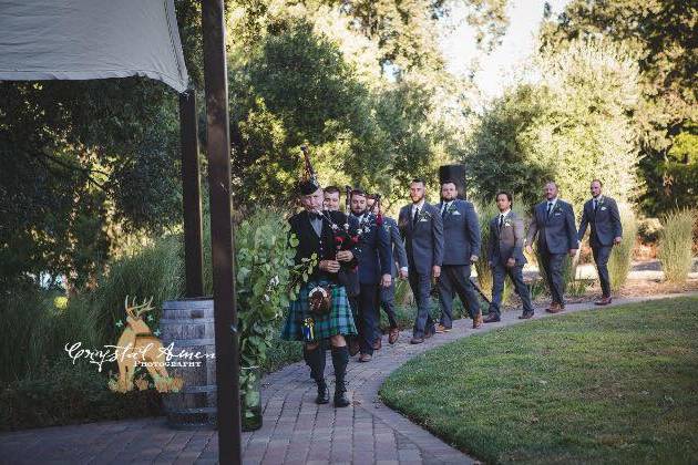 Leading the groom and his men