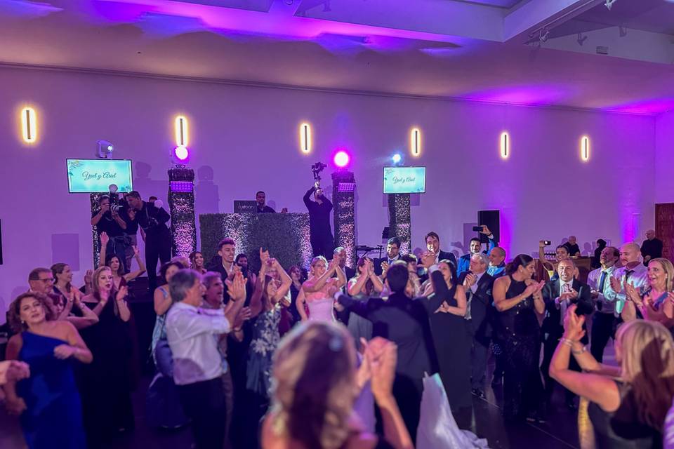 Wedding Guests Celebrating on the Dance Floor