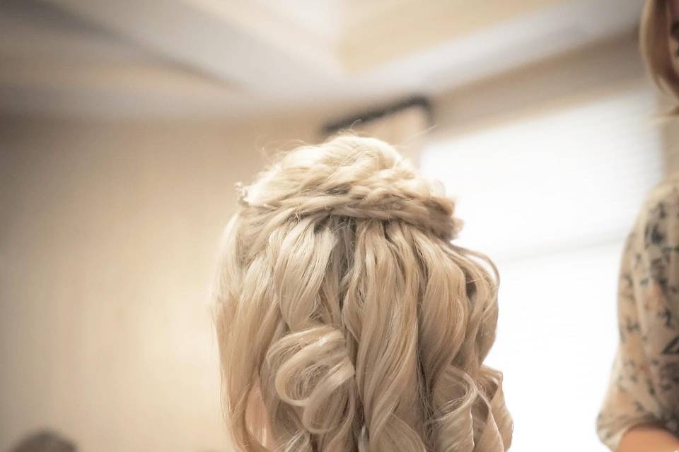 Braided and curled half updo