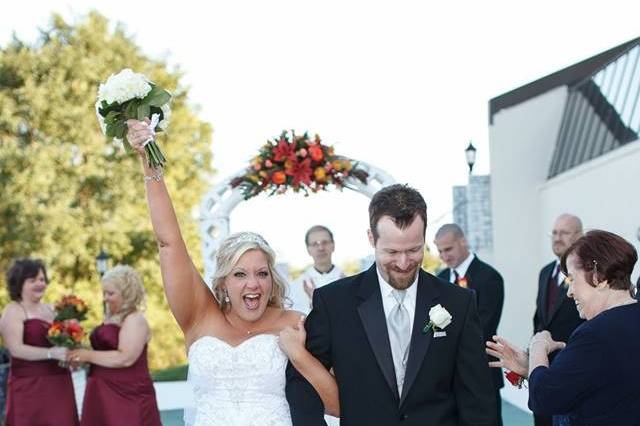 Leaving the ceremony as newlyweds