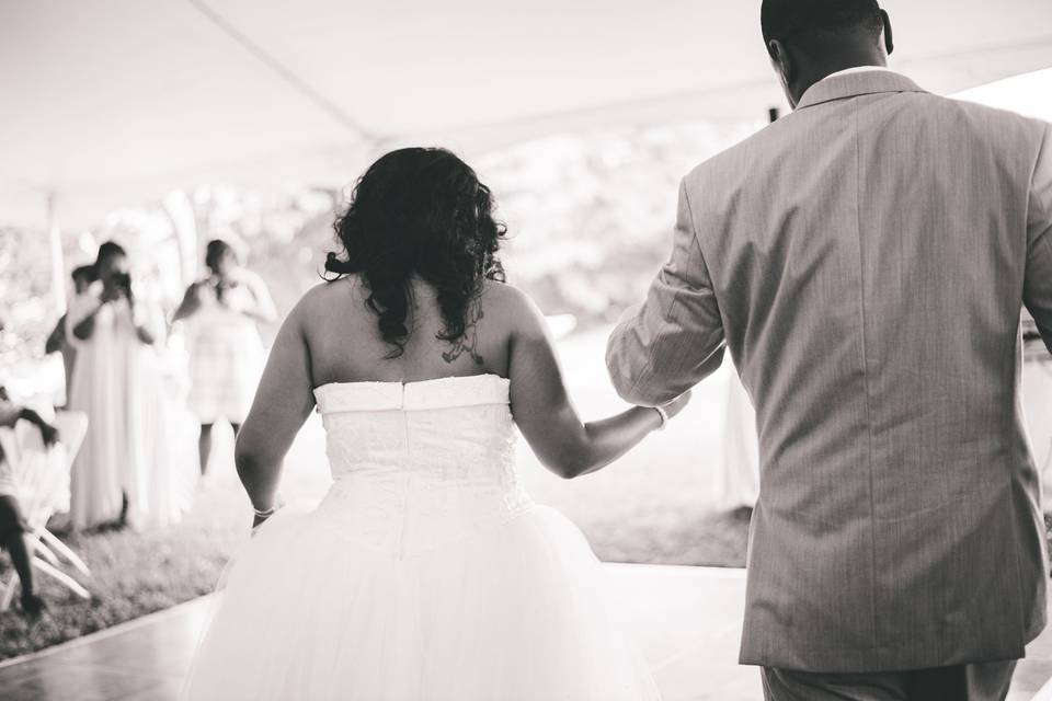 Newlyweds walk down the aisle