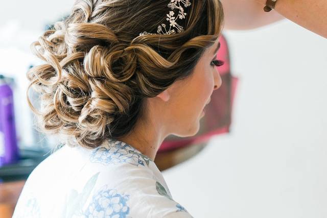 Loose updo for our beautiful bride kelly