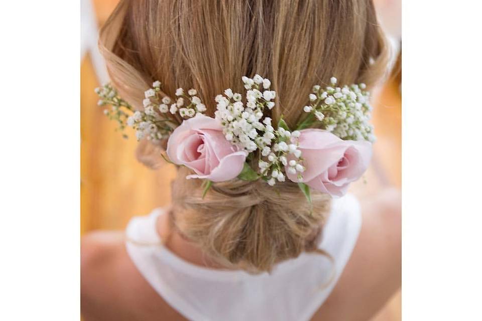 Soft updo and flower headpiece by michelle