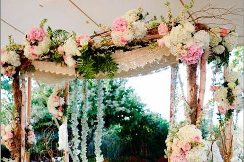 Nothing is more beautiful than an outdoor ceremony..Arches are very popular and lovely. It really pulls the outdoor seenery together