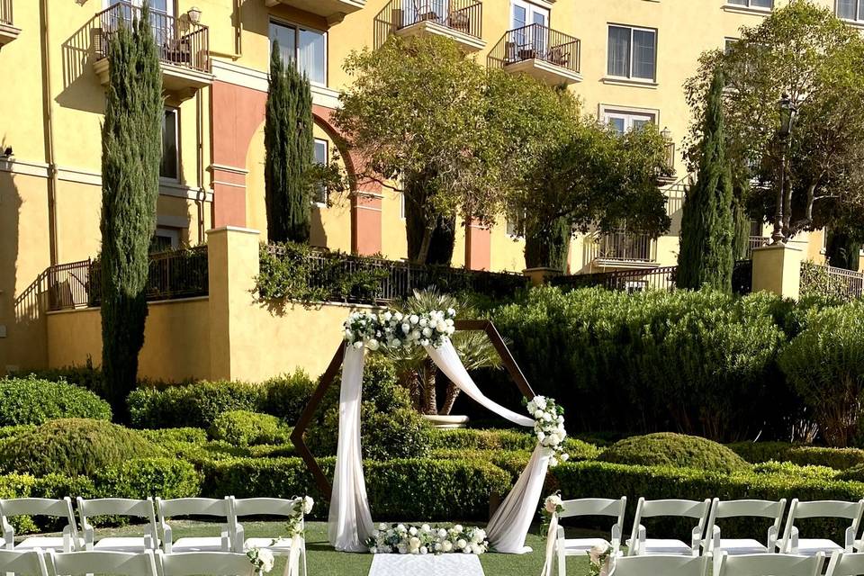 Wedding arch and chairs