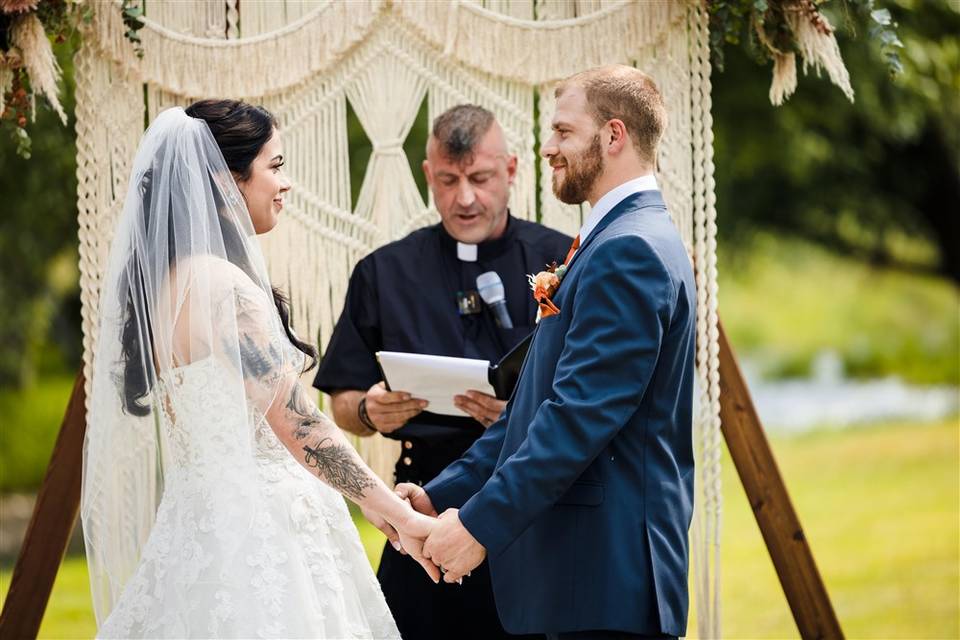 Vows beside the river.