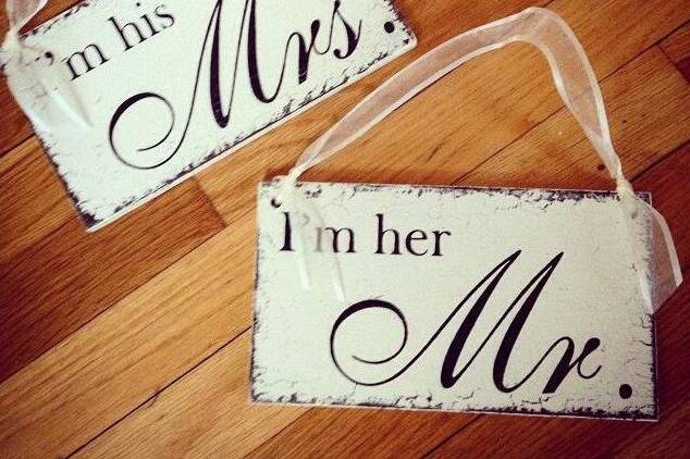 Mr. and Mrs. sign