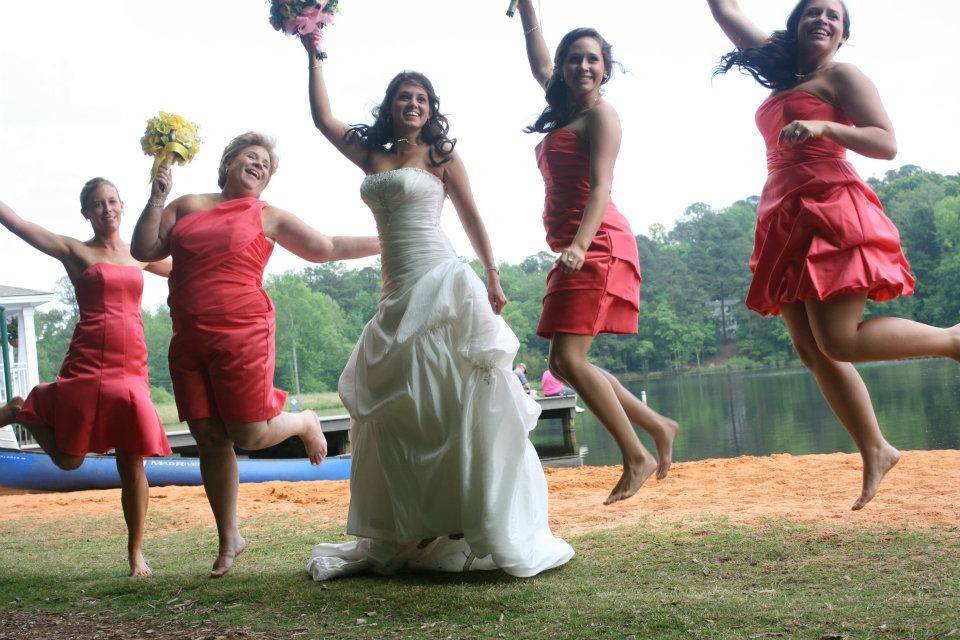Jump shot of bride and bridesmaids