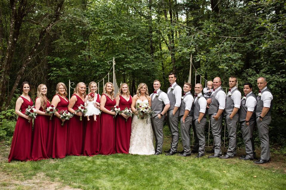 Newlyweds, bridesmaids, and groomsmen