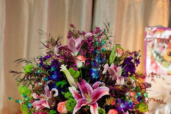 Reception flower arrangement | Designer, Erin McClellan Photography Courtesy of William McKee with The Collective Photographers