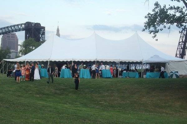 high peak tent with chairs and tables