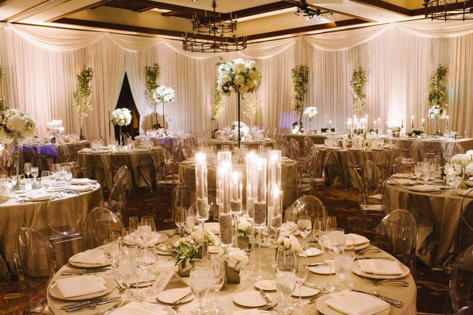 Table setting with tall floral centerpiece