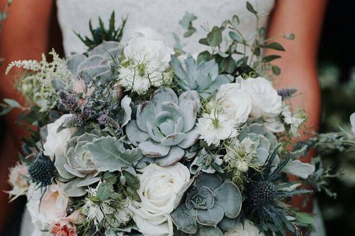 Succulents and white roses bouquet