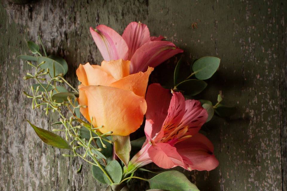Pink and orange boutonniere
