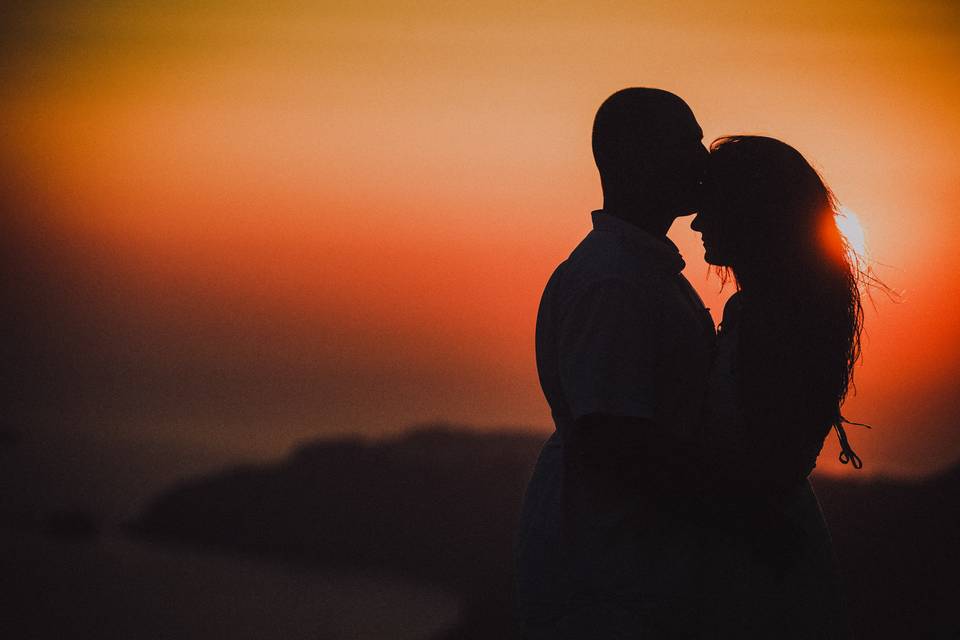 Sunset forehead kiss