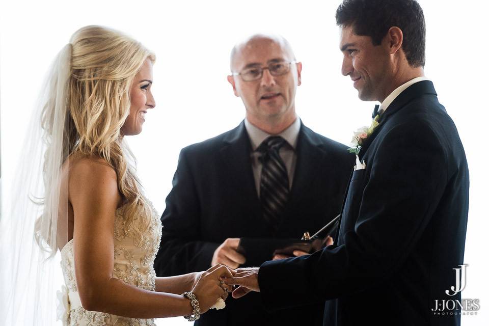 Bride escorted to her groom