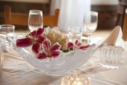 Choose from our selection of Simon Pearce glassware and pottery to personalize your centerpieces