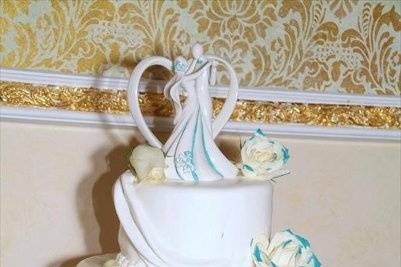 I custom painted topper to match wedding colors