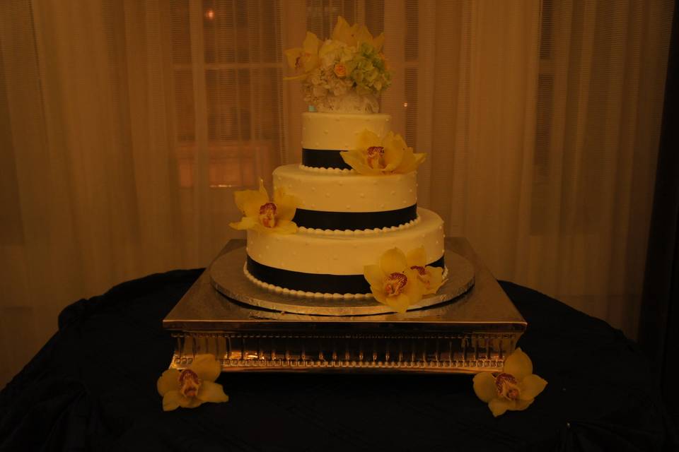 Wedding cake with black ribbons