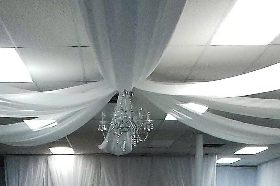 Ceiling draping included