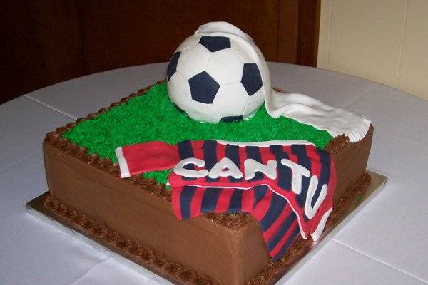 Created for a soccer-playing groom.  A combination of buttercream frosting and fondant.