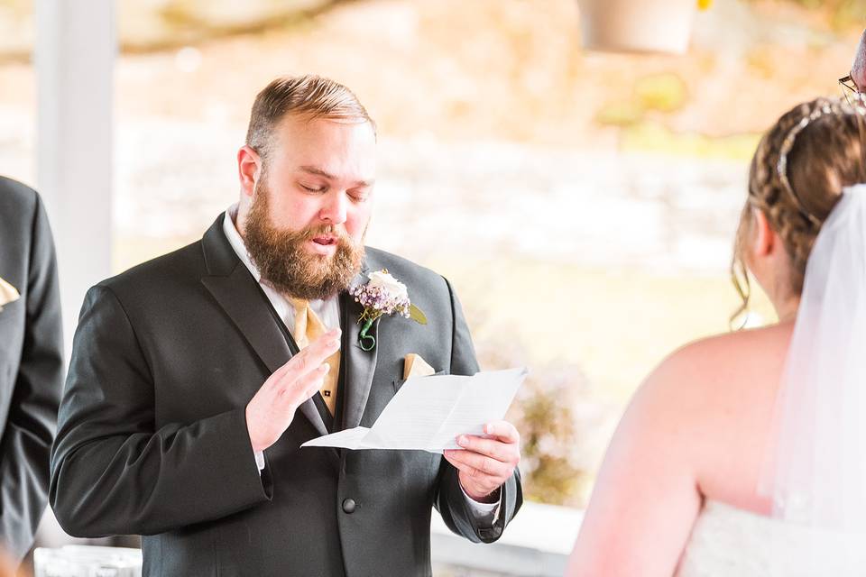 Groom crying at ceremony