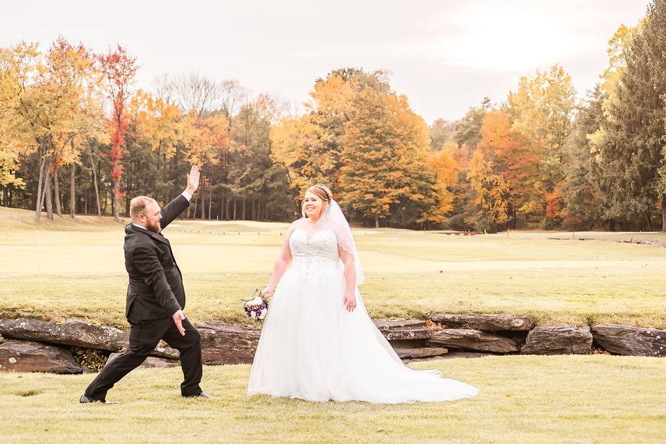 Groom showing off his wife