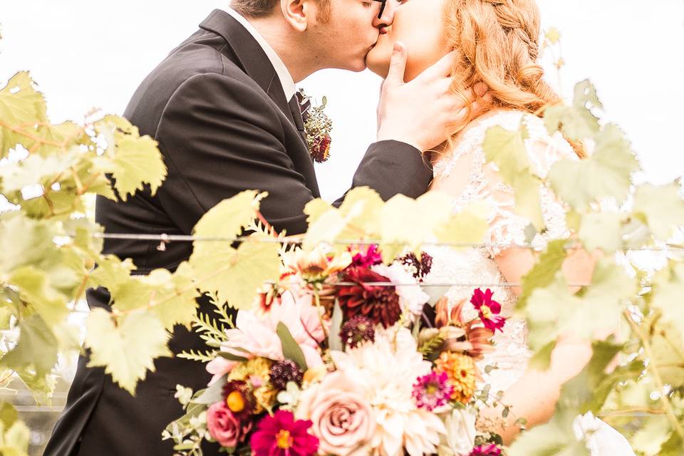 Bride and groom kissing