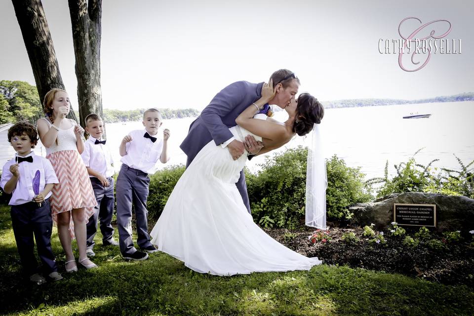 Jason and Jamie were married in a little chapel, on Culver's Lake, in northern NJ. I love this whole image, as it captures the joy of not only the couple and their first married kisses... but the chllidren with the bubbles does it for me.