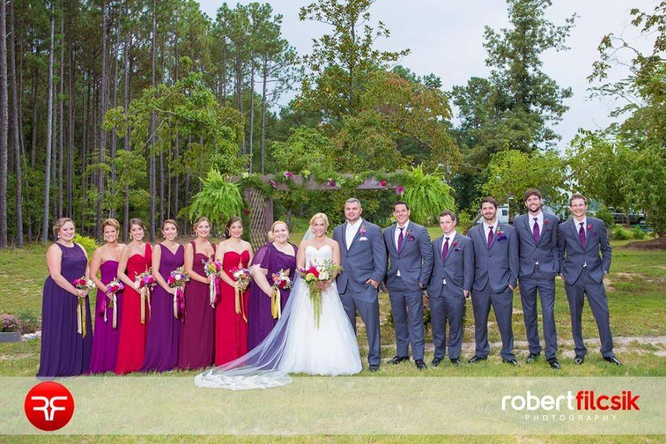 Couple with the wedding attendants