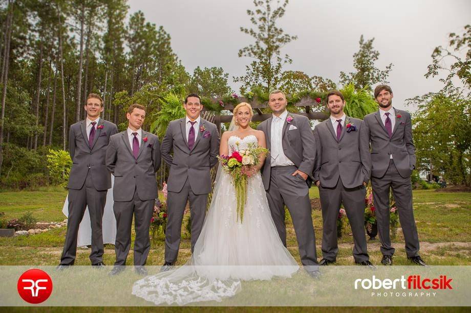 The newlyweds with groomsmen