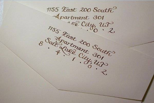 Calligraphy for return addresses, in brown ink.
