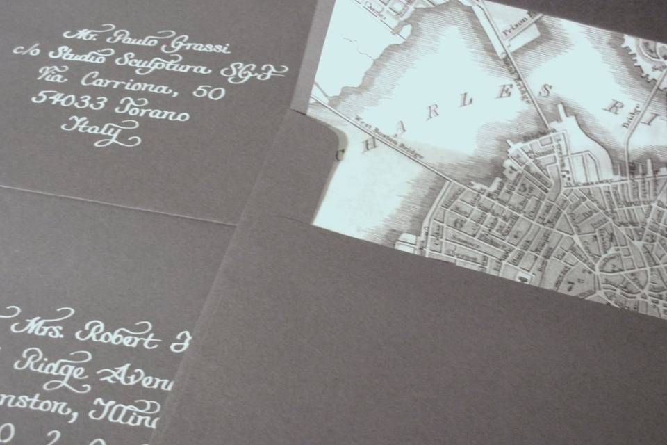 Wedding Invitation Calligraphy - White Ink on Charcoal Grey Envelopes. This bride used a map of Boston as an envelope liner to personalize her invitations - nice touch!