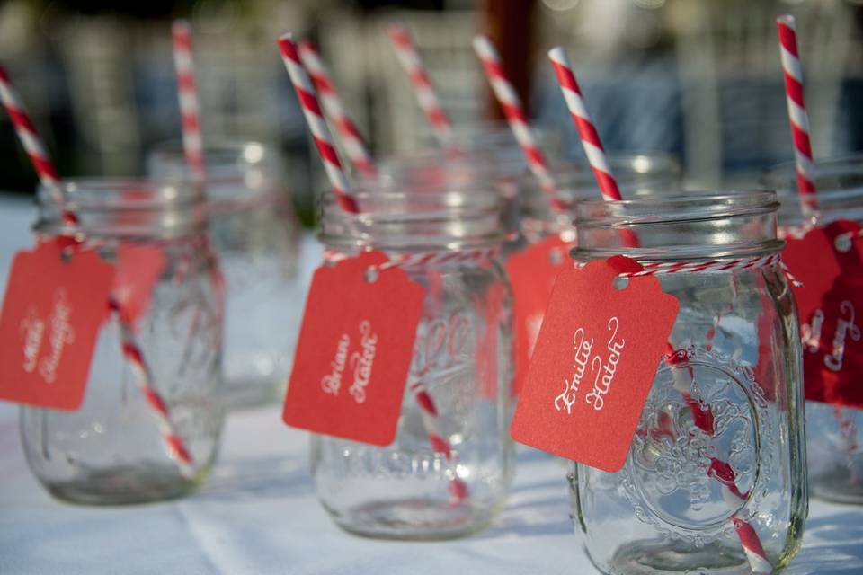 Do something different for your place cards: use mason jars both as wedding favors and have guest names written out in calligraphy and attached as labels!
Image from Stacey Kane Photography: http://www.staceykane.com/