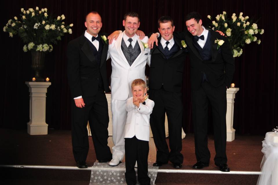 The groom with the wedding attendants