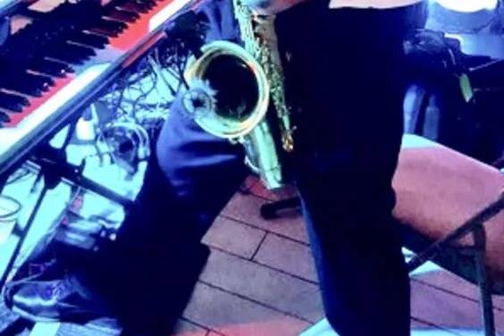 Jon playing sax & keys