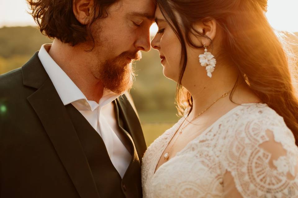 Bride and groom at sunset
