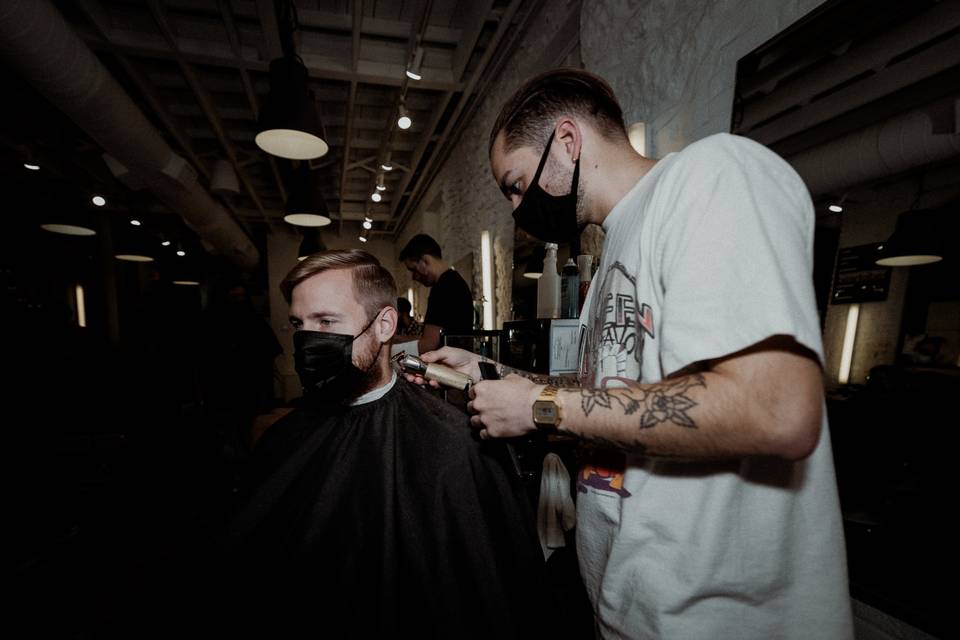 Groom getting his hair cut