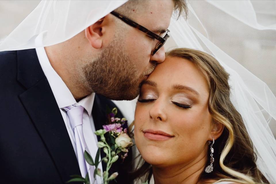 Bride and groom share a tender