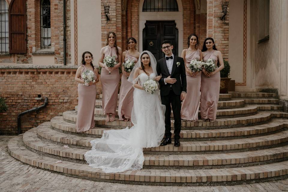 Bridesmaids with couple