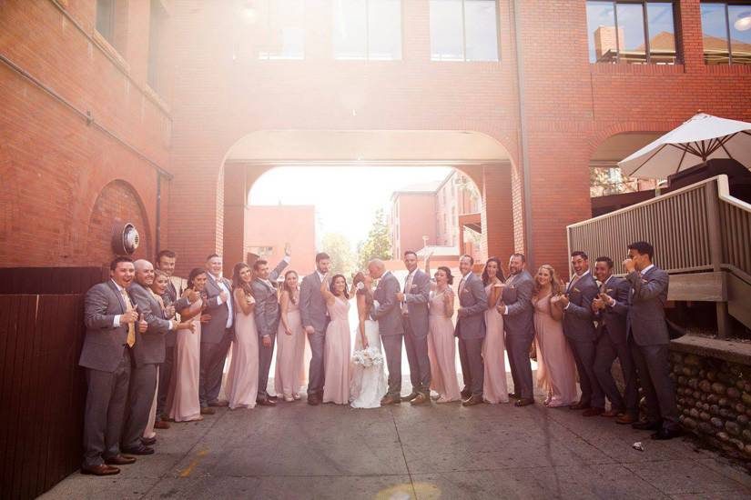 The couple with the bridesmaids and groomsmen