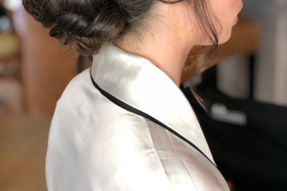 Sophisticated updo with braided pieces